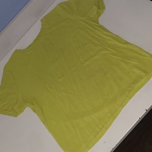 This beautiful shirt is from Zara. It is a size medium. The color is lime green